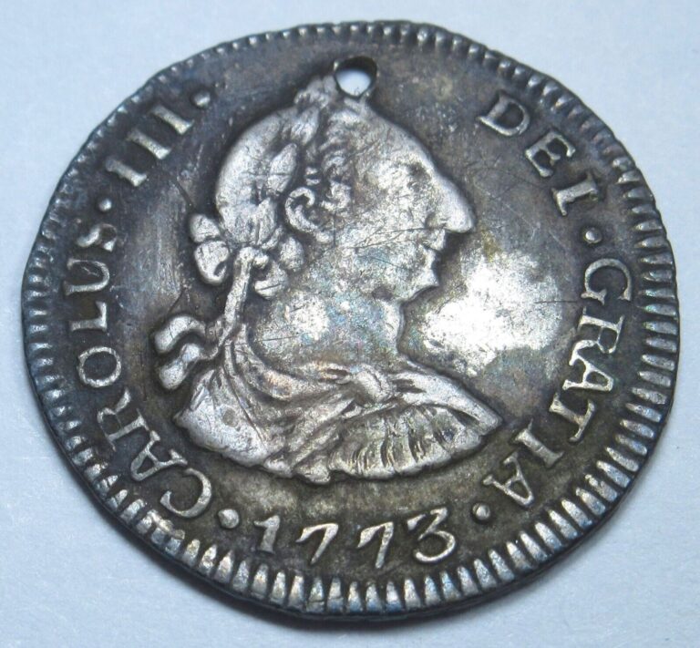 Read more about the article 1773 G P Guatemala Holed Silver 1/2 Reales Antique 1700’s Spanish Colonial Coin