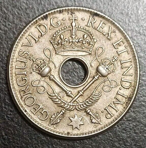 Read more about the article 1938 New Guinea One Shilling Silver Coin XF KM 8