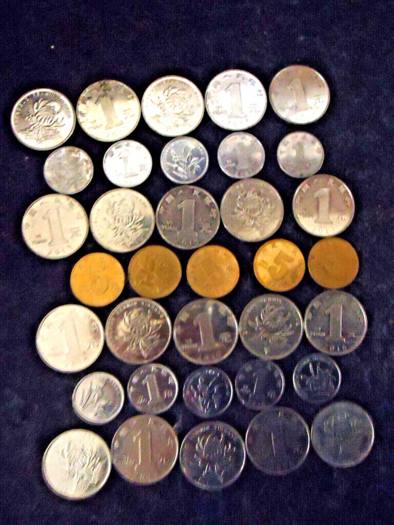 Read more about the article Lot of 35 ASSORTED  CHINESE COINS (20) 1 YI YANG (10) 1 YI JAIO  and (5) 5 WU JAIO