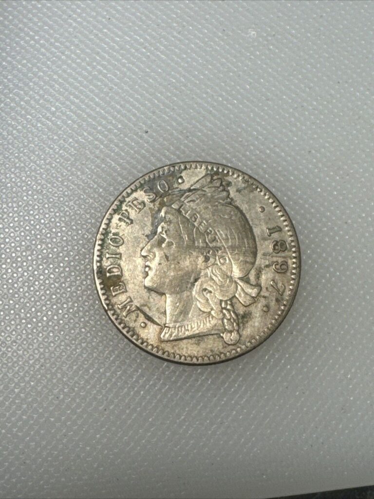 Read more about the article 1897 Dominican Republic 1/2 Peso TY