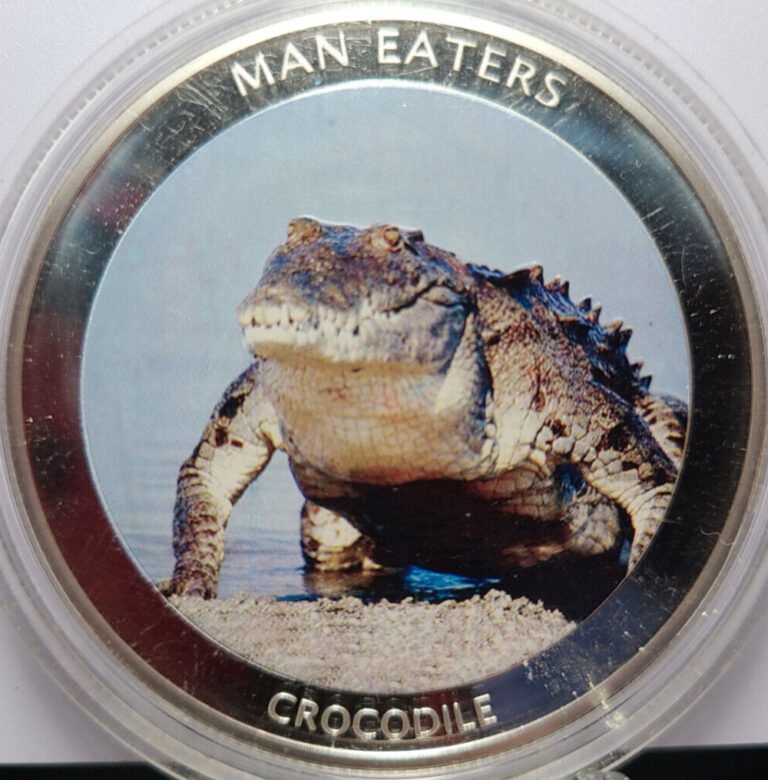 Read more about the article 2010 Uganda 100 Shillings Man Eaters Series CROCODILE Huge 50mm Coin PROOF