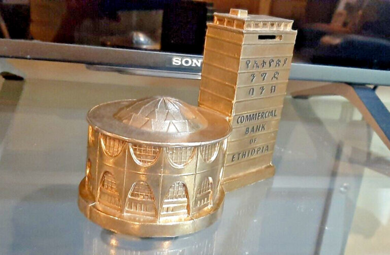 Read more about the article RARE Commercial Bank of Ethiopia Promotional Coin Bank Metal Souvenir Building