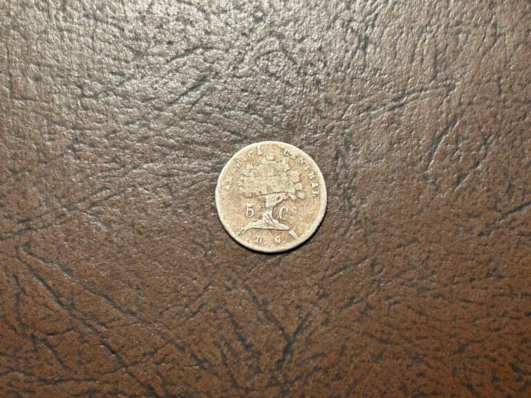 Read more about the article 1865 Costs Rica 5 Centavos Rare Book Filler
