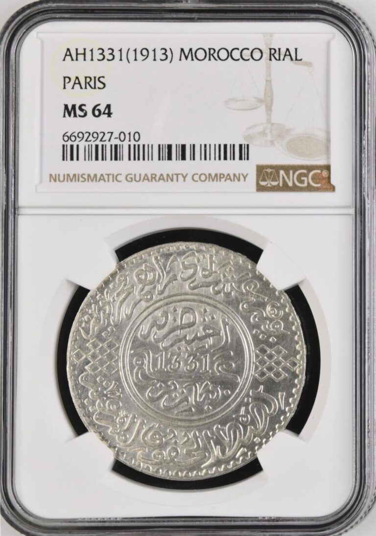 Read more about the article MOROCCO   SILVER 1 RIAL ( 10 DIRHAMS ) 1331 AH – PARIS – NGC MS 64   RAREK