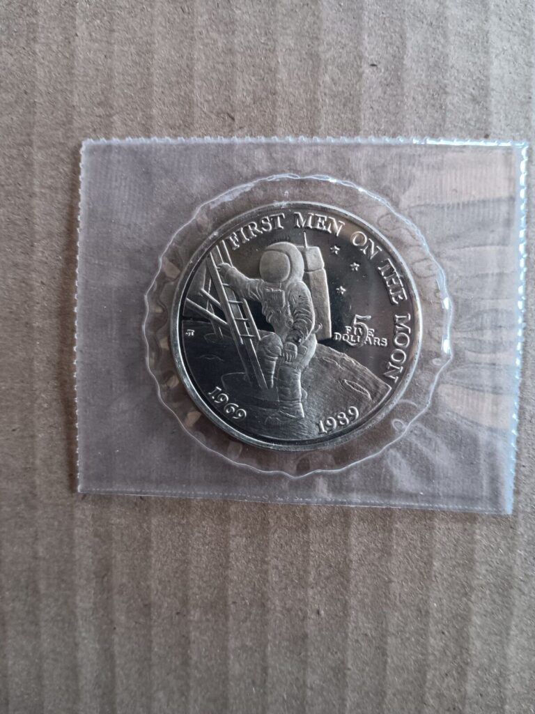 Read more about the article Republic of the Marshall Islands First Men on the Moon $5 Commemorative Coin