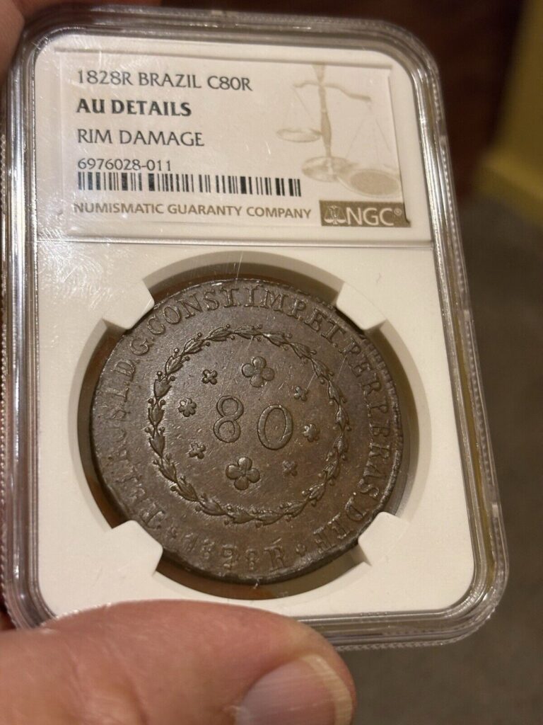 Read more about the article 1828 R Brazil C80r Ngc Au Details Great Looking Coin Even With The Rim Ding