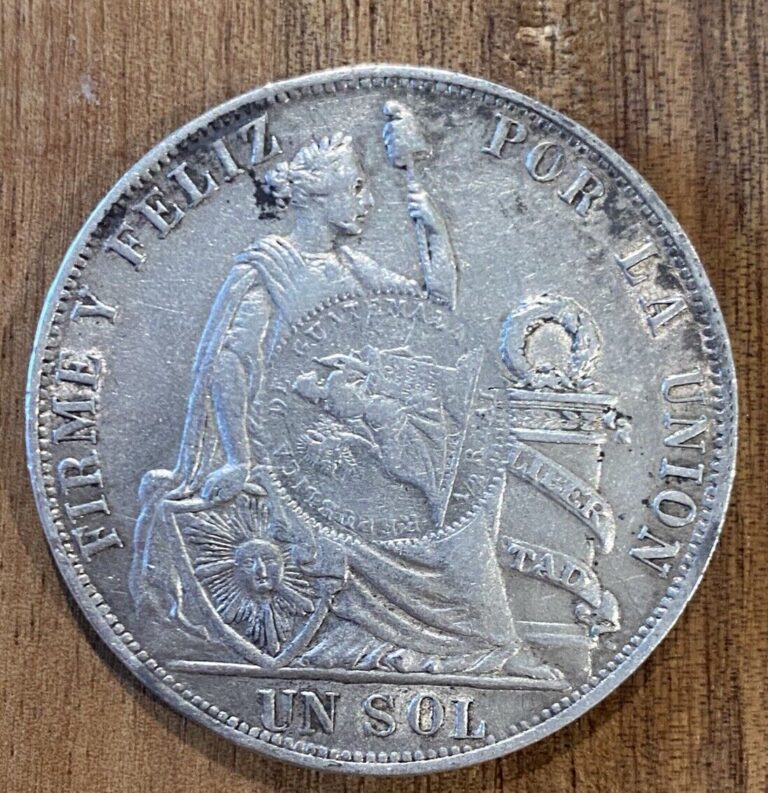 Read more about the article Silver 1894 Guatemala  ½ Real Counter stamp on 1889 T.F. Sol of Peru Peso 25 g