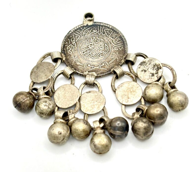 Read more about the article VINTAGE Riyal Silver Coin With 10 bells PENDANT Necklace Saudi Arabia Antique