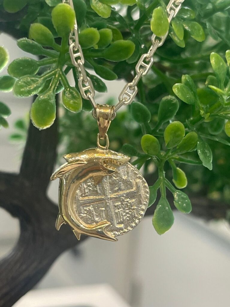 Read more about the article NUESTRA SENORA DE ATOCHA SILVER COIN PENDANT IN 10K REAL GOLD FISH