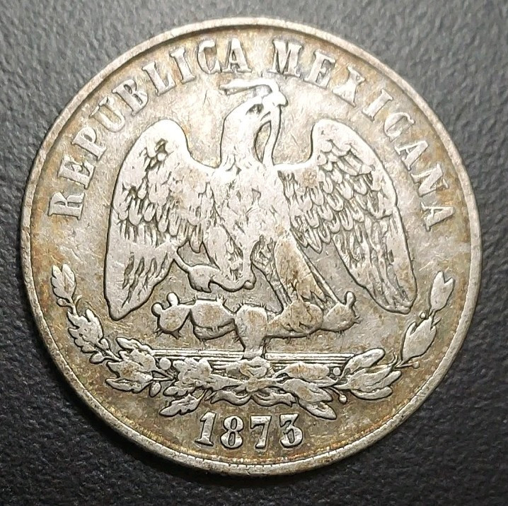 Read more about the article 1873 Zs H Mexico 2nd Republic Mexicana Peso Zacatecas 902.7 Large Silver Coin VF