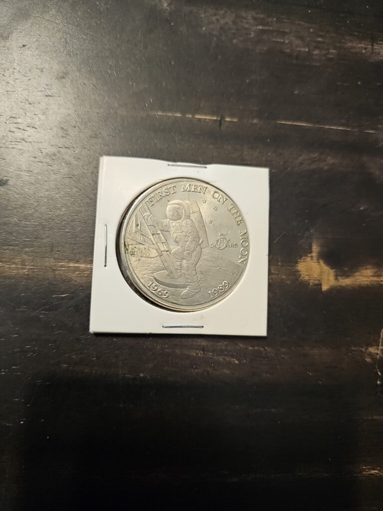 Read more about the article Republic of the Marshall Islands First Men on the Moon $5 Commemorative Coin