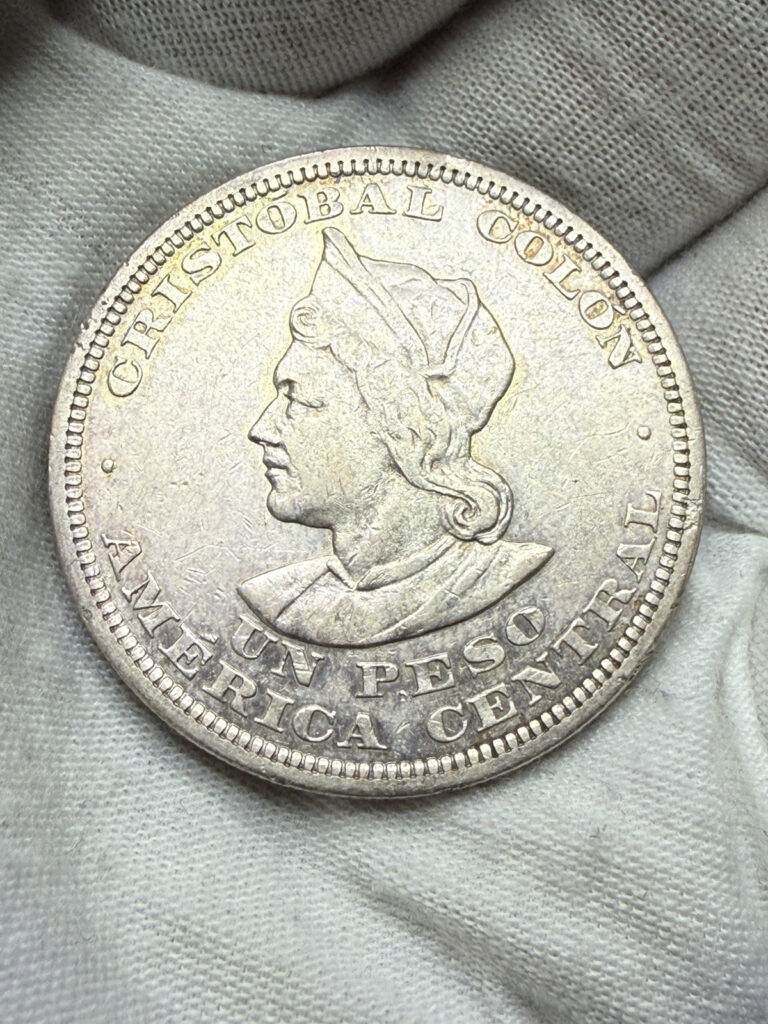 Read more about the article 1911 El Salvador One Peso Cristobal Colon Silver Coin F105