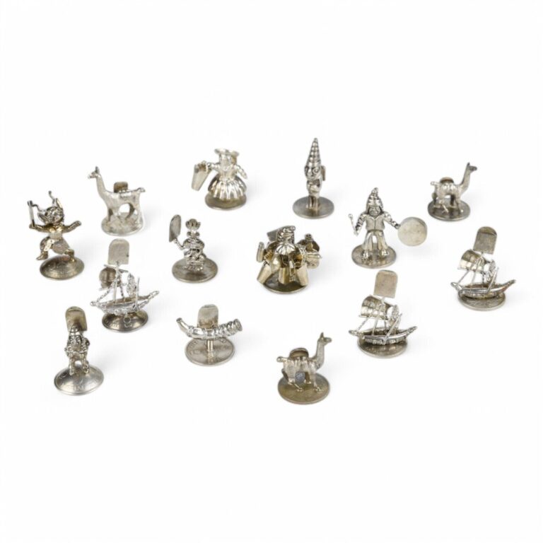 Read more about the article 14 Antique Silver Figural Place Card Holders with Authentic Bolivia Coins