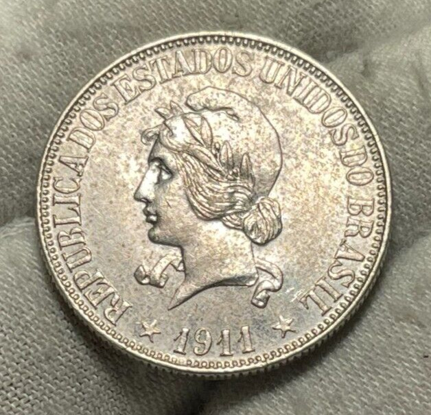 Read more about the article 1911 Brazil 1000 Reis Silver Coin High Grade Cleaned