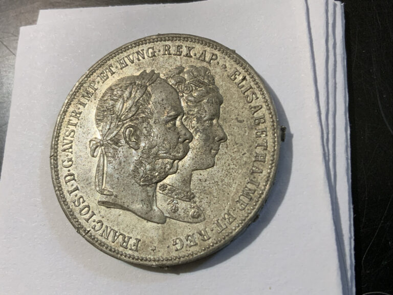 Read more about the article 1879 Austria 2 Florin Wedding  Anniversary (Mount Removals on Edge) Silver