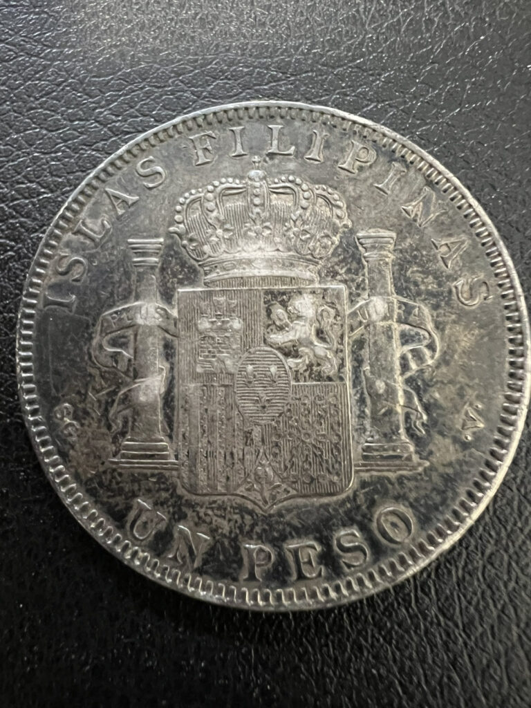 Read more about the article 1897 PHILIPPINES 1 UN PESO- ALFONSO XIII