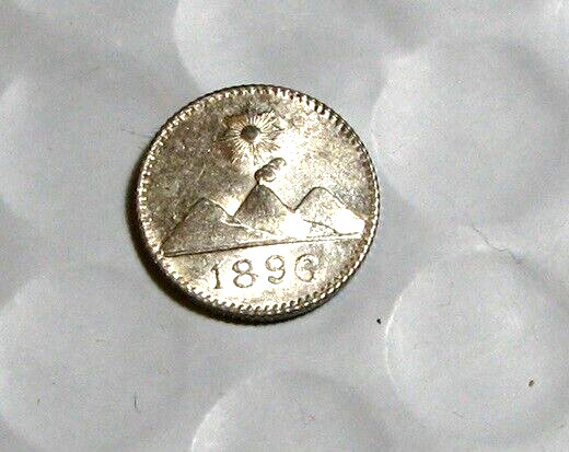 Read more about the article 1896 Guatemala 1/4 Real Silver AU/Unc KM