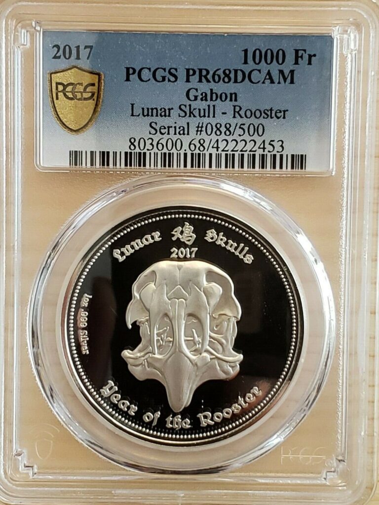 Read more about the article 2017 Lunar Skull Rooster Gabon 1000Fr Silver Proof PCGS PR69DCAM #088