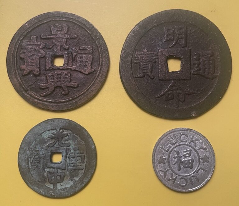 Read more about the article Vietnam War Charm Coins Lot of 4