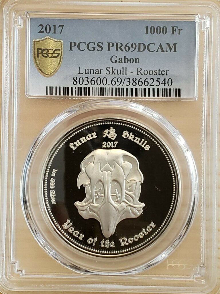 Read more about the article 2017 Lunar Skull Rooster Gabon 1000Fr Silver Proof PCGS PR69DCAM #006