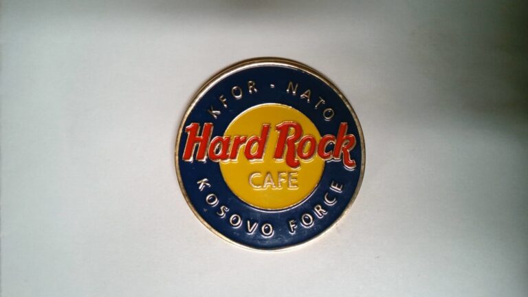 Read more about the article CHALLENGE COIN OLDER KFOR NATO KOSOVO FORCE HARD ROCK CAFE ROCKING THE BALKANS