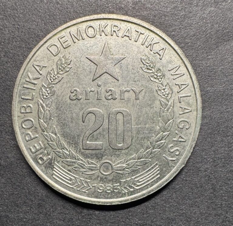Read more about the article 1983 Madagascar 20 Ariary Large World Foreign Coin Tractor Farming Sun Uncommon