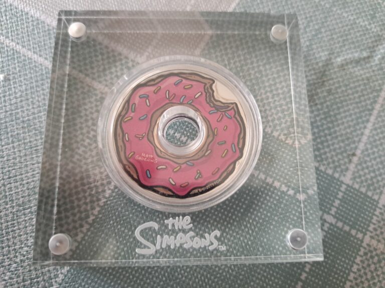 Read more about the article 2019 Tuvalu The Simpsons Donut 1 oz Colored Silver Proof Coin with Box and COA