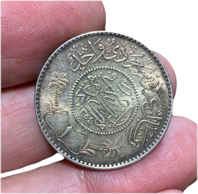 Read more about the article Saudi Arabia 1 Riyal 1955(?) .917 Silver coin  AU/UNC with great toning!