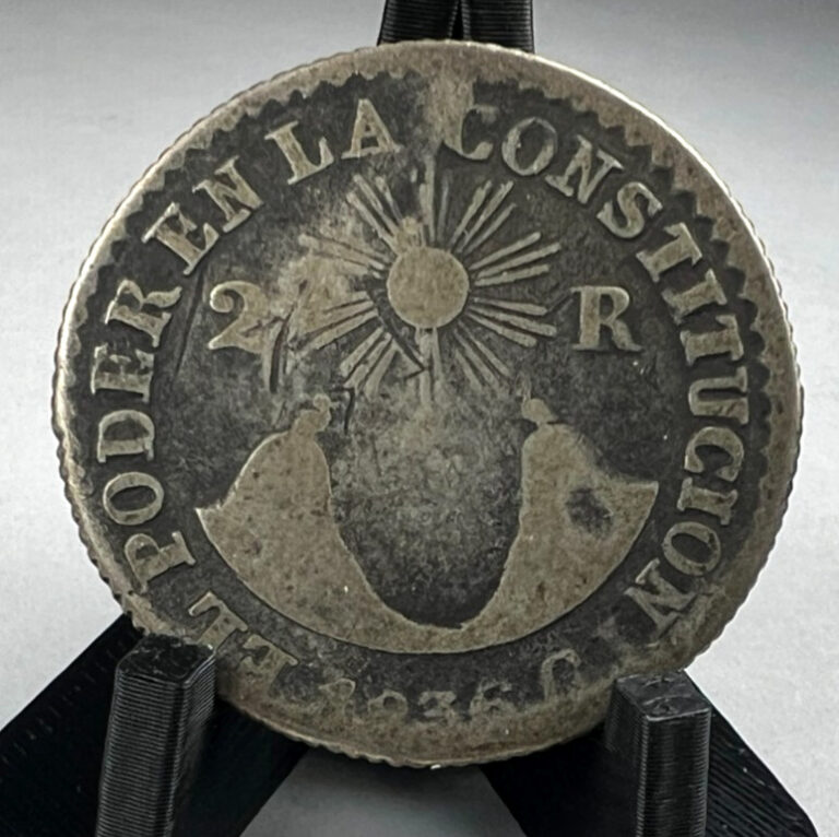 Read more about the article 1836 Ecuador 2 Reales KM# 18  Silver  Sun face above volcano  SCARCE!