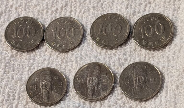Read more about the article (Lot Of 7) South Korea 100 Won Coins (1991  1994  1996  2000  2001  2005  2009)