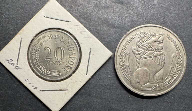 Read more about the article Singapore Lot Of 2 Coins 20 Cents Marlin Fish One Dollar Crown Lion World