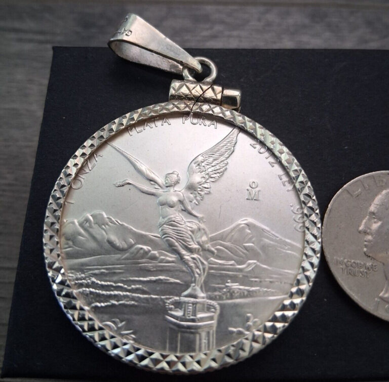Read more about the article moneda de 1 onza y bizel  de plata 925 plata real autentica y marcada Mexicana.
