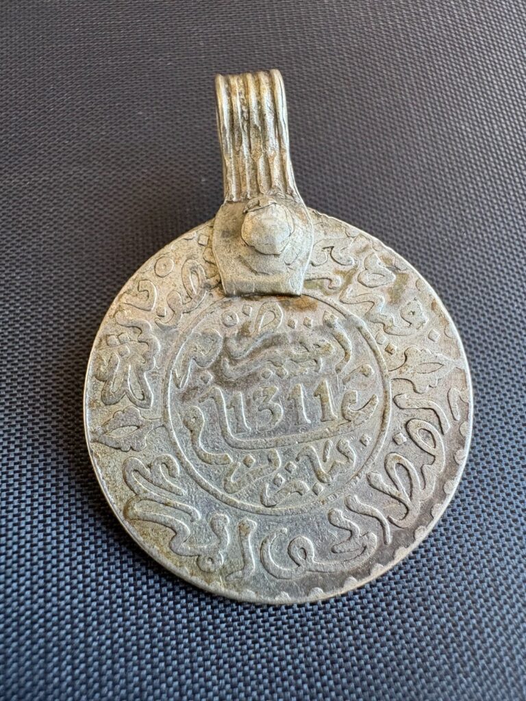 Read more about the article Antique Silver Moroccan Coin Pendant 1311 AH 1893 AD Rare Very Old Coin