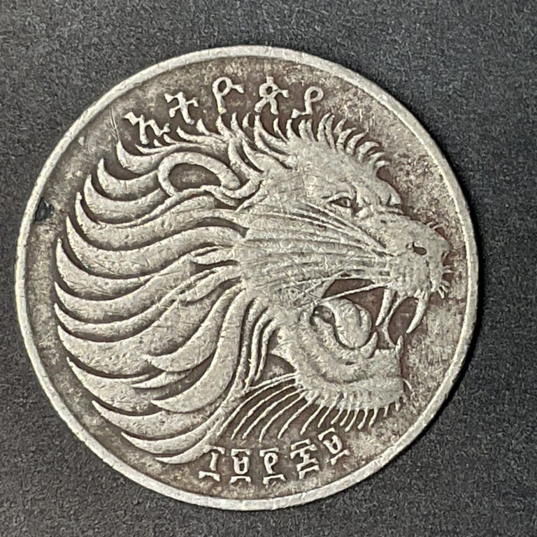 Read more about the article ETHIOPIA 50 SANTIM ROARING LION’S HEAD SOLDIER WOMAN Foreign World Coins