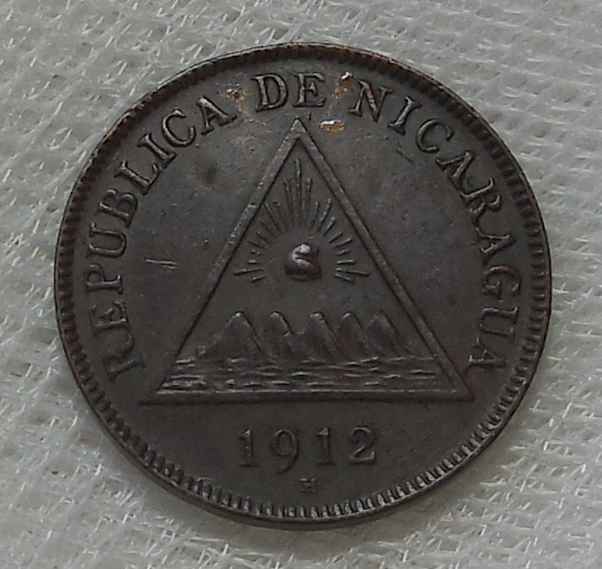 Read more about the article 1912 H NICARAGUA 1 CENTAVO BRONZE COIN XF