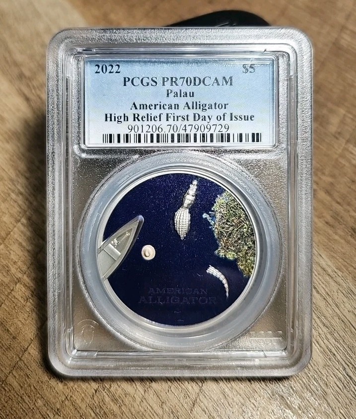 Read more about the article 2022 CIT Palau Colorized -🐊 Silver High Relief American Alligator PF70 🤩