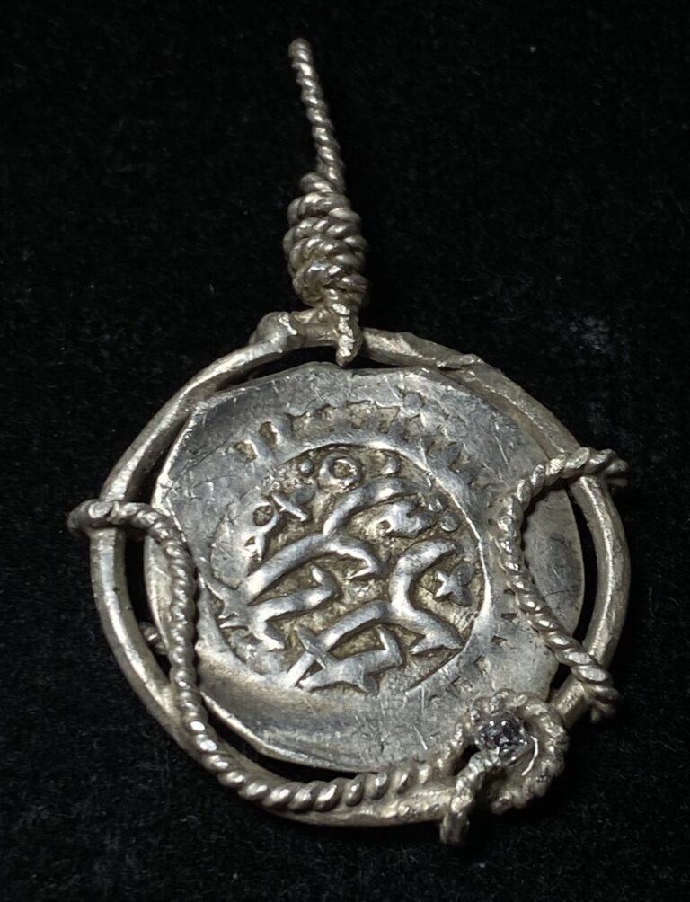 Read more about the article Year 1194 Dated 1-Dirham Silver Islamic Coin from Morocco in Bezel w/ Diamond