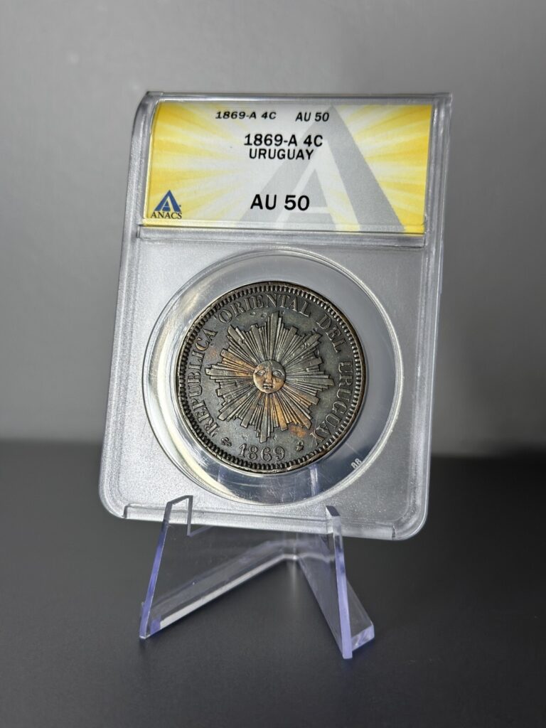 Read more about the article 1869 A URUGUAY 4 CENTESIMOS RADIANT SUN ANACS AU50 COIN