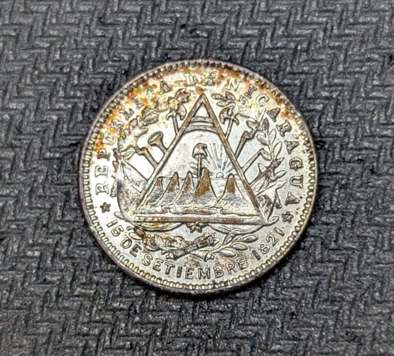 Read more about the article 1887 H Nicaragua Silver 10 Centavos AU Cleaned Red Toning KM#6
