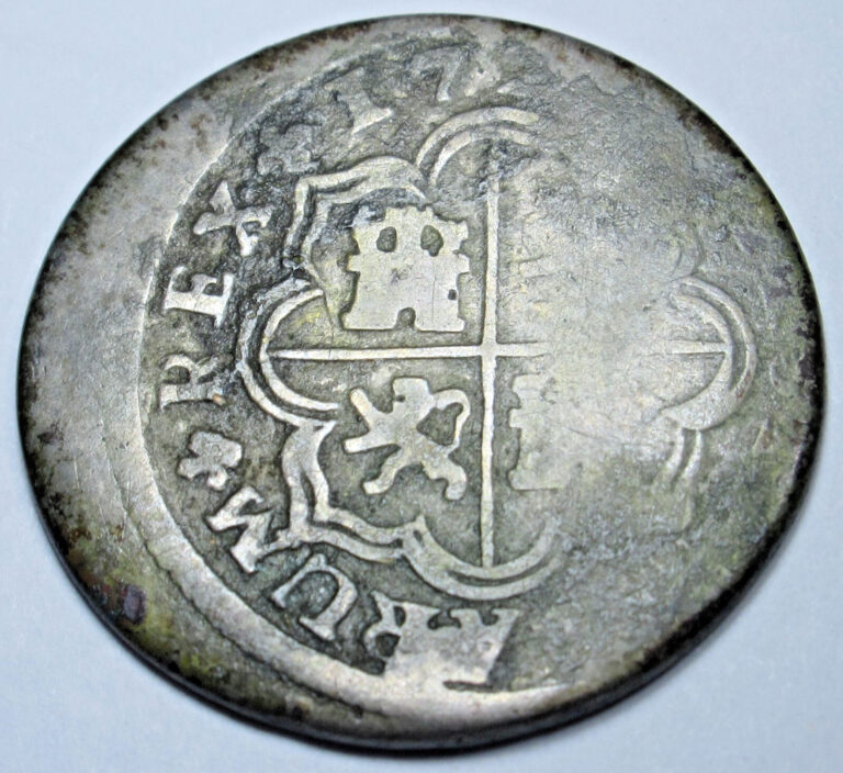 Read more about the article 1720-1729 Spanish Silver 1 Reales Off Center Genuine 1700s Old Cross Pirate Coin