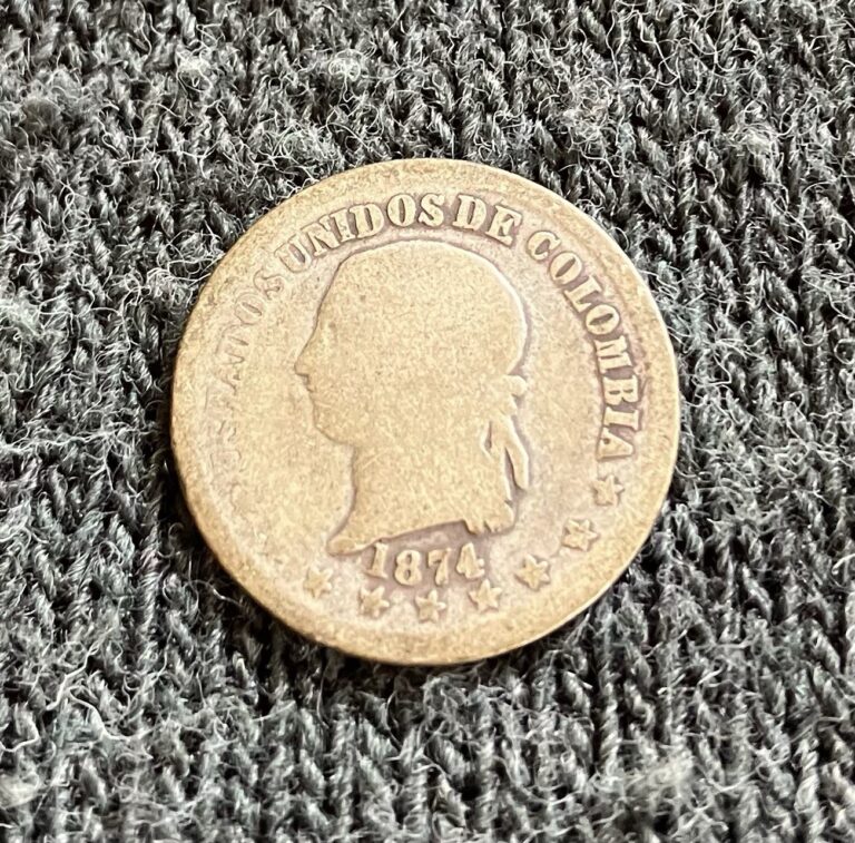 Read more about the article 1874 Bogota Columbia Toned 10 Centavos 83.5% Silver 179 000  Minted |S161