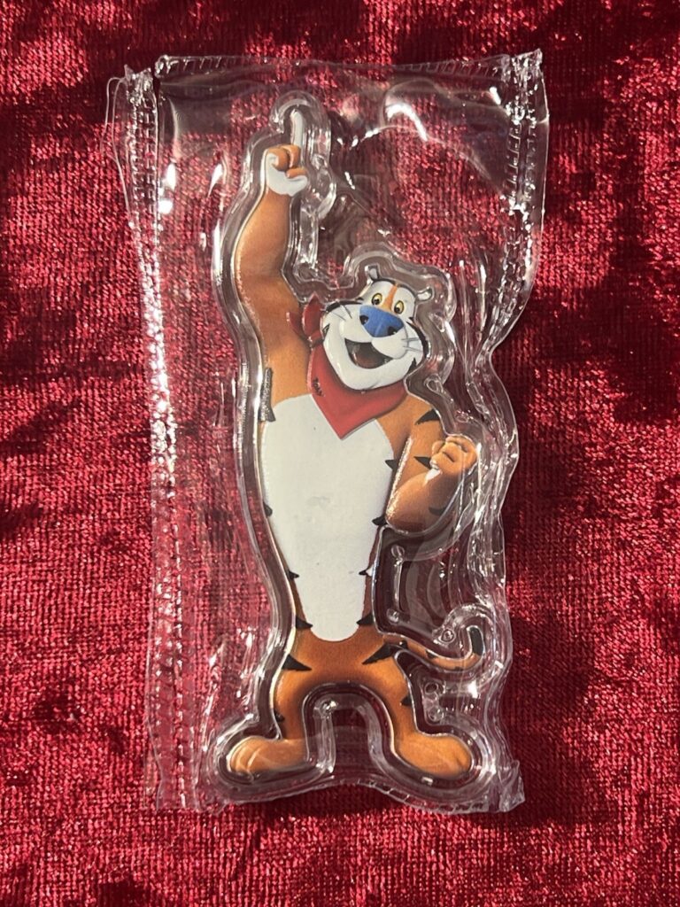 Read more about the article 2024 Chad Kelloggs Frosted Flakes Cereal TONY TIGER Shaped Coin 1 oz Fine Silver