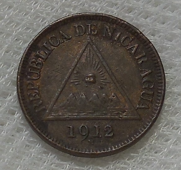 Read more about the article 1912 H NICARAGUA 1/2 CENTAVO BRONZE COIN
