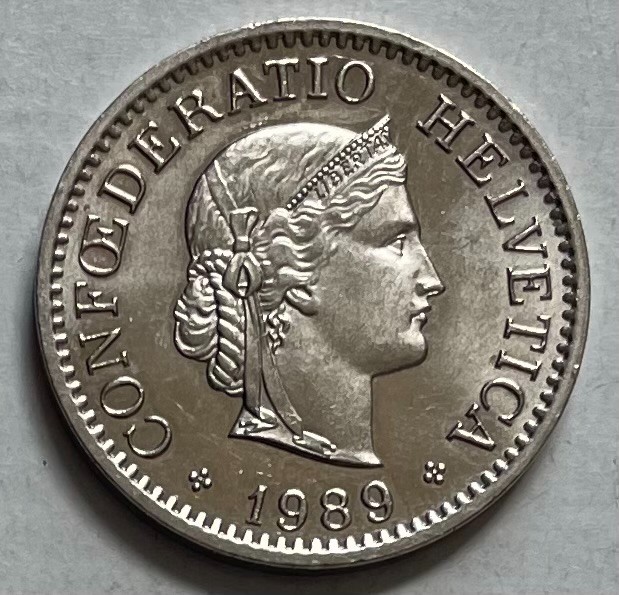 Read more about the article Switzerland 10 Rappen 1989 – Helvetia – Roman Goddess Libertas