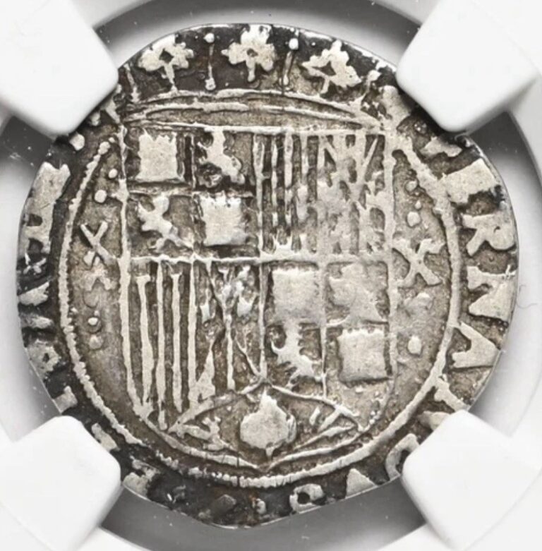 Read more about the article SPAIN Ferdinand V and Isabella I 1469-1504 Colonial Silver Real  1474 Seville 1497