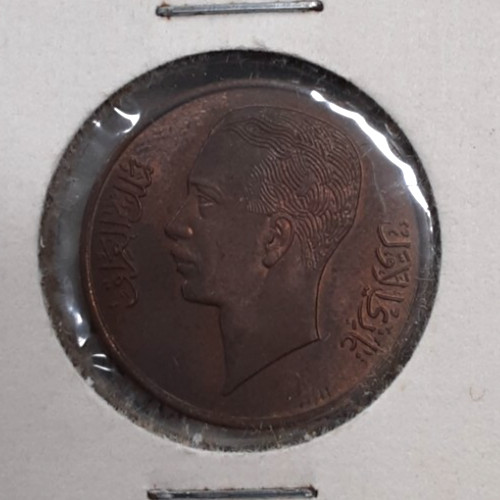 Read more about the article Iraq 1938 Bronze 1 Fils Coin of Ghazi I  KM#102  UNC w/Toning