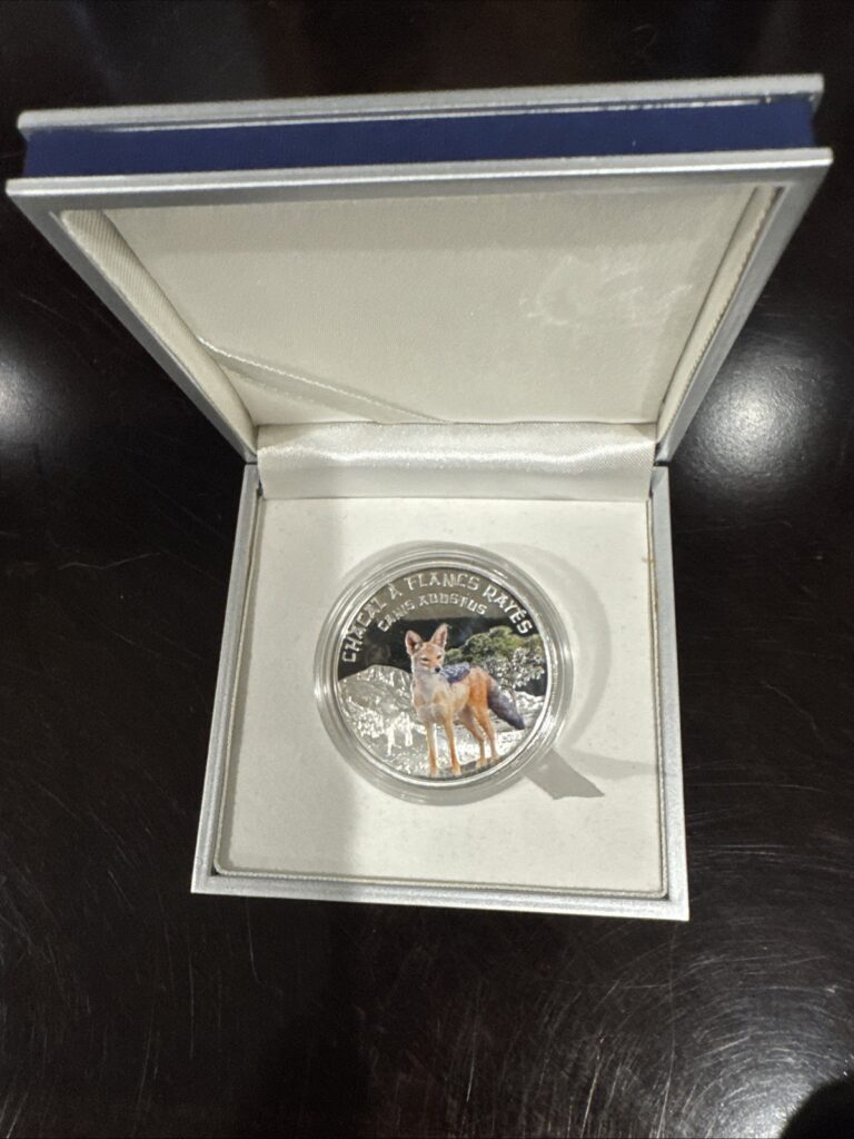 Read more about the article 2012 Niger 1000 Francs Color Silver Proof  Striped Jackal -mintage 1000-Box/COA