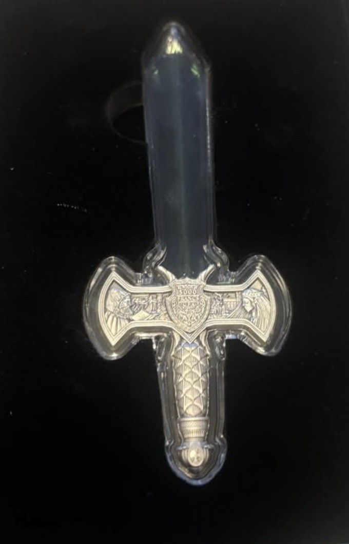 Read more about the article 2025 Rep.of Chad 1 oz Silver Excalibur Sword Shaped Coin