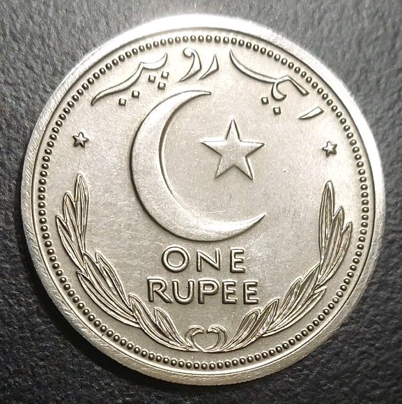 Read more about the article 1948 PAKISTAN 1 RUPEE BU UNC HIGH GRADE NICKEL COIN KM 7 CRESCENT  STAR and TUGHRA