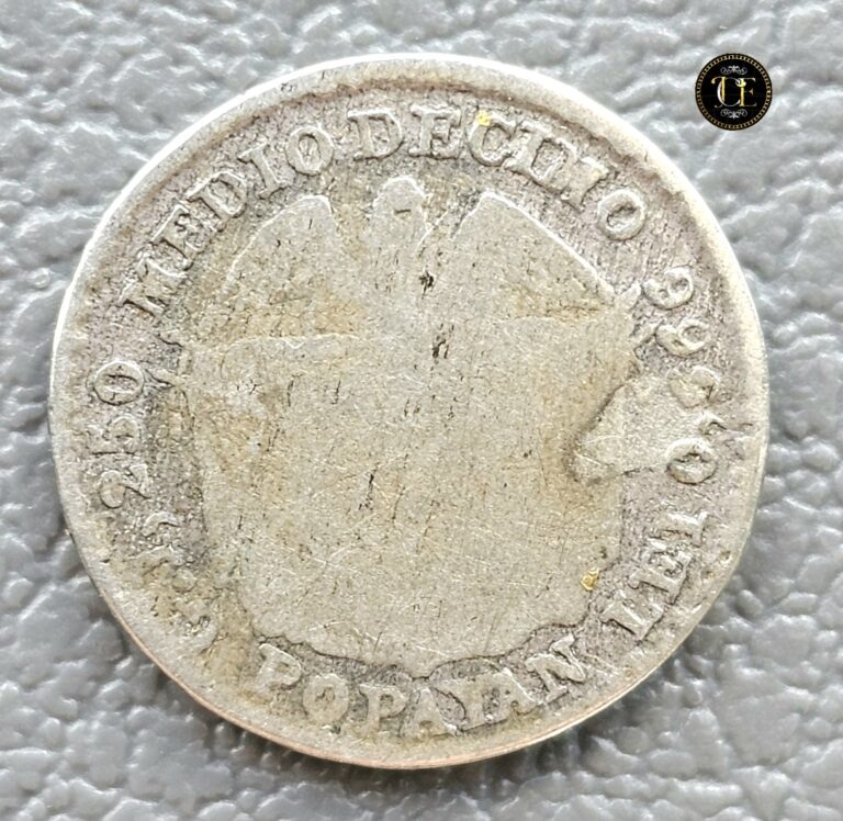 Read more about the article 1875 -1/2 Decimo Real Colombia Silver Coin  Low Mint  Tiny  ¡VERY RARE and SCARCE!